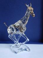 Swarovski - Beeldje - Große gallopierende Giraffe 935896 mit, Antiek en Kunst