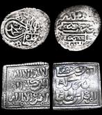 Verzameling bestaande uit 2 islamitische zilveren munten.