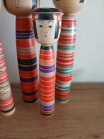Acht vintage traditionele Tsuchiyu houten Kokeshi-poppen -
