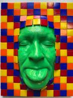 gregos - Green mockery behind colored tiles