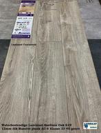 12mm Waterbestendig Laminaat 7X Kleur Natuur Eik v.a. €16,95, Huis en Inrichting, Nieuw, 75 m² of meer, Laminaat, Grijs