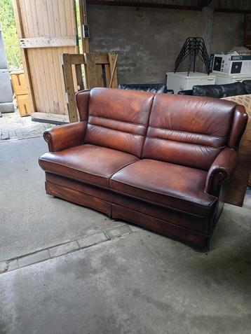 Vintage lederen 2 zits bank beschikbaar voor biedingen