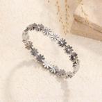 Armband met madeliefsluiting en bloemdetails met steentjes, Staal, Nieuw, Ophalen of Verzenden, Goud