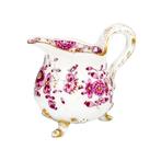 Meissen Small creamer painted with flowers and raised on