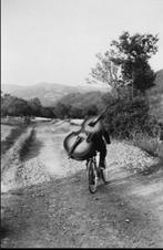 Henri Cartier-Bresson (1908–2004) - Bass player on the road