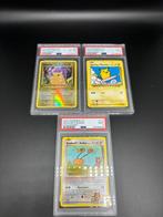 Pokémon - 3 Graded card - Surfing & Rev Holo Pikachu +, Hobby en Vrije tijd, Verzamelkaartspellen | Pokémon, Nieuw