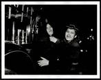 Weegee - Ms. Henrietta Torres and Her Daughter Ada watch as