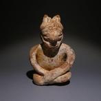 Colima, Westkust Mexico Terracotta Zittend figuur. 7 cm H.