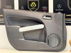 Mazda 2 4-deurs portier bekleding links voor bj.2012, Gebruikt, Mazda