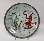 Large Chinese charger decorated with a dragon and a phoenix, Antiek en Kunst