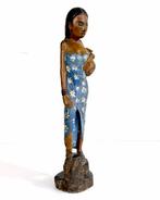 African wooden sculpture – Female figure carrying a vessel –