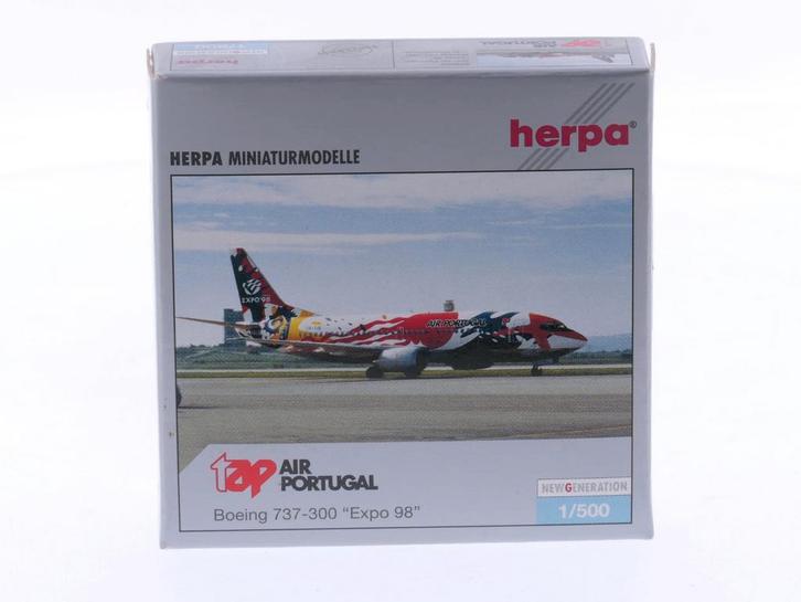 Schaal 1:500 Herpa 505802 TAP - Air Portugal Expo 98 B..., Hobby en Vrije tijd, Modelbouw | Vliegtuigen en Helikopters, Zo goed als nieuw