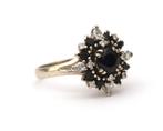 Een 18 krt. witgouden ring met saffier en diamant, Gebruikt