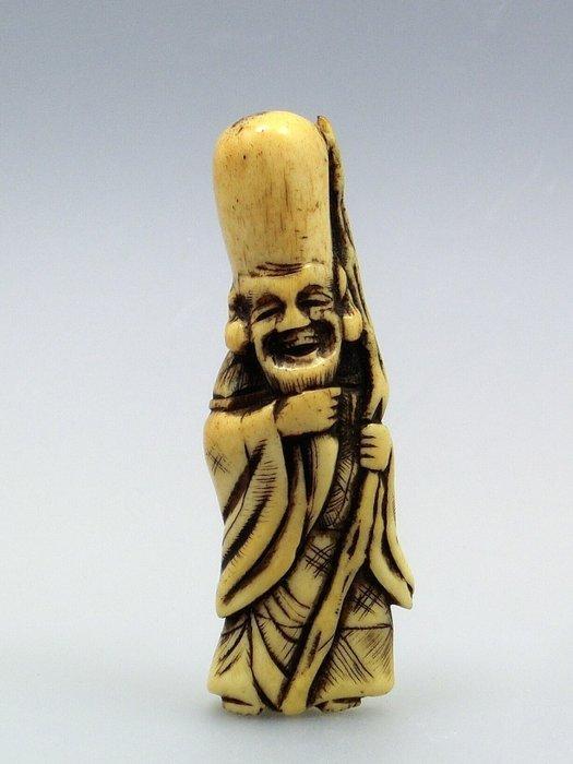 Netsuke die Jurojin afbeeldt, die zijn baard vasthoudt in, Antiek en Kunst, Antiek | Overige Antiek