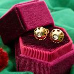 Gouden oorstekers met diamant | 0,04 ct. (rond briljant), Gebruikt, Overige kleuren, Ophalen of Verzenden, Met edelsteen