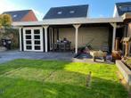 Voorbeeld van een tuinhuis met overkapping, maatwerk.