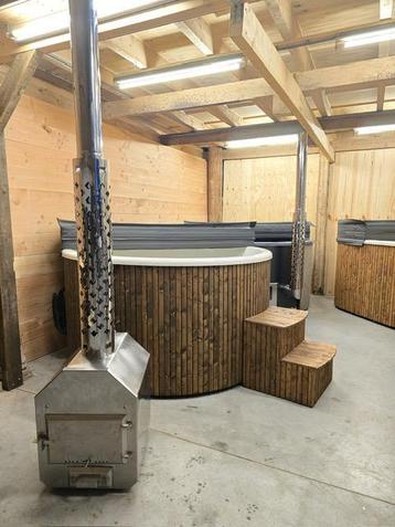 Hottub met externe kachel beschikbaar voor biedingen