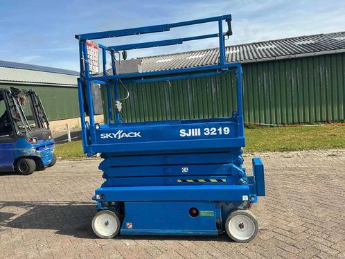 Veiling: Schaarlift Skyjack SJIII 3219 Elektrisch 7.79m 2012, Zakelijke goederen, Machines en Bouw | Liften, Steigers en Ladders