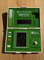 Bandai - HIKYO AMAZON Solar-Powered LCD Handheld Game –, Nieuw