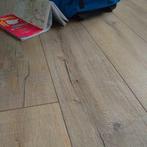 Swiss XL 30244 Robuust donker eik 4V 8mm laminaat € 17,95, Huis en Inrichting, Stoffering | Vloerbedekking, Ophalen, 75 m² of meer