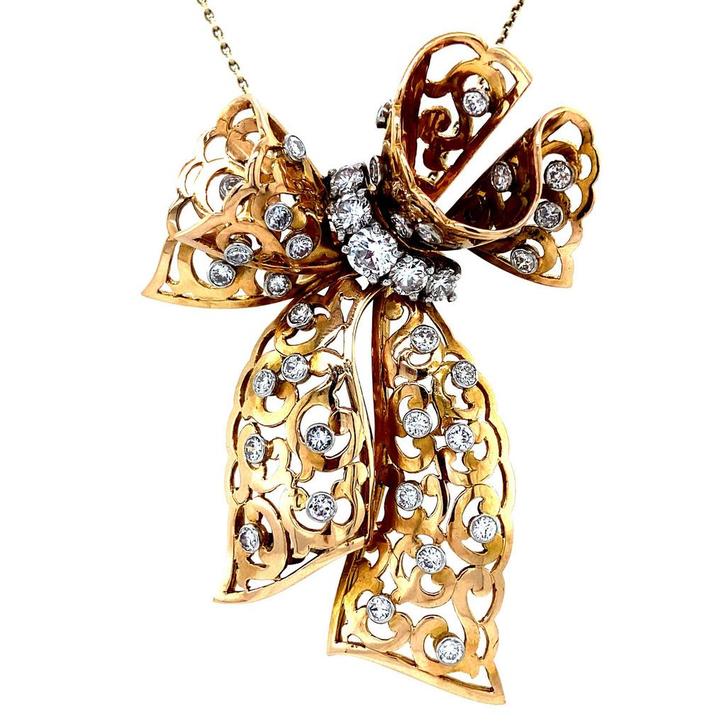 Gouden strik hanger met diamant 14 krt/950, Sieraden, Tassen en Uiterlijk, Kettinghangers, Nieuw, Ophalen of Verzenden