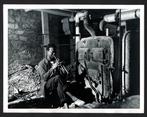Weegee - Lonesome Tune A man playing the trumpet alone in a