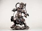 The guardian deity of the Asakusa  Kaminarimon ,