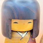 Twee vintage Kokeshi, gesigneerd door Usaburo & Hajime