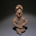 Colima, westkust van Mexico Terracotta Zittend figuur. 9,5