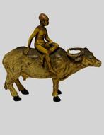 Beeldje - Young Arab riding a cow - Koud geverfd brons