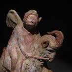 Oud-Grieks Terracotta Eros rijdend op een geit. 4e - 3e eeuw