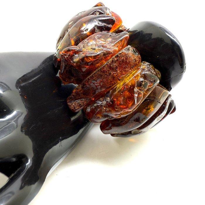 Natuurlijk Baltisch amber brede manchetklem armband 62,9, Antiek en Kunst, Curiosa en Brocante