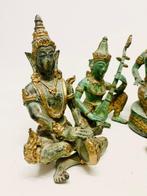 Set of Four Thai Gilt and Patinated Bronze Musician Figures