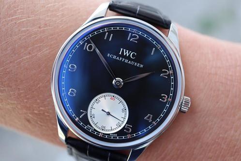IWC Portuguese hand-wound 10/2012 Full set, goede conditie., Sieraden, Tassen en Uiterlijk, Horloges | Heren, Leer, Zo goed als nieuw
