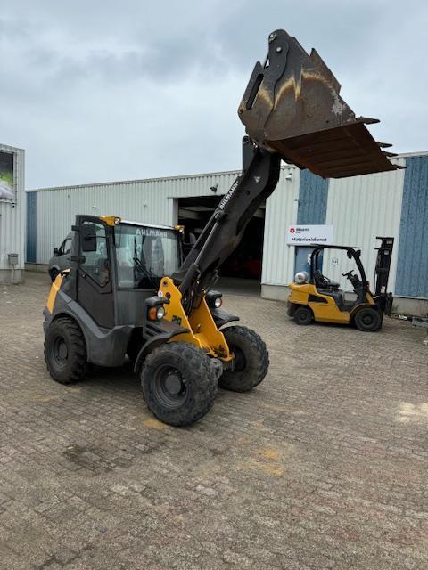 Wiellader AHLMANN AX 1000- uren 1.876, Zakelijke goederen, Machines en Bouw | Kranen en Graafmachines, Wiellader of Shovel, Ophalen