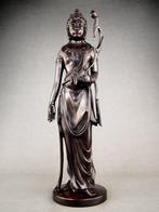 Buddhist bodhisattva who observes and listens to the