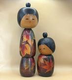 Paar creatieve Kokeshi-poppen van Koson Sato met