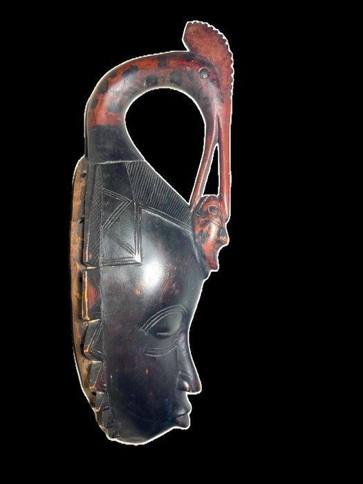 Afrikaanse Guro vogelmasker met vis in de snavel – jaren, Antiek en Kunst, Kunst | Niet-Westerse kunst