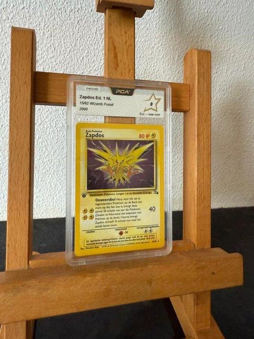 PCA Zapdos 1ST edition - 1 Graded card - Pokémon Zapdos 1st, Hobby en Vrije tijd, Verzamelkaartspellen | Pokémon
