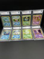 Pokémon - 8 Graded card - BULBASAUR HOLO & IVYSAUR HOLO &, Hobby en Vrije tijd, Verzamelkaartspellen | Pokémon, Nieuw