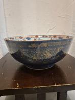 Bol en porselein uit China XVIIIe eeuw, poederblauw, met