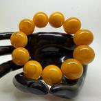 Armband met grote Baltische barnsteen kralen, 21 mm, 50,1 g