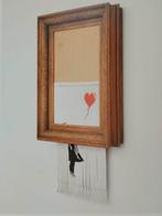 Banksy (1974) - Love is in the Bin