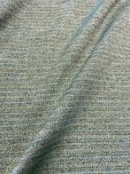 Prachtig geweven, kleurrijk textiel met een ruwe