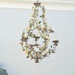 Kroonluchter - Een kooi versierd met met de hand gevormde