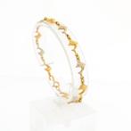 18 krt. Bicolor gouden armband van dolfijnen | 19,5 cm, Ophalen of Verzenden, Gebruikt, Overige kleuren, Goud