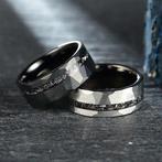 Tungstenen ring. Meteorietinleg. De energie van het