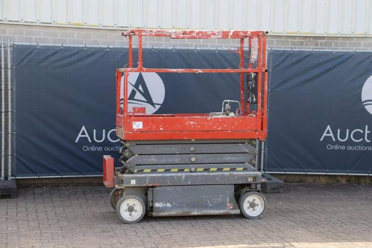 Veiling: Schaarlift Skyjack SJIII 3219 Elektrisch 7.79m 2015, Zakelijke goederen, Machines en Bouw | Liften, Steigers en Ladders