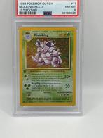 Pokémon - 1 Graded card - Nidoking base 1st edition - PSA 8, Hobby en Vrije tijd, Verzamelkaartspellen | Pokémon, Nieuw