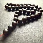 Tesbih gebedsketting Baltic Amber kralen ø16mm in zwart kers